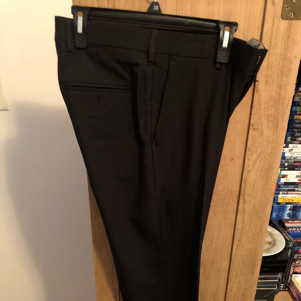 Men’s slacks. Slim fit. Worn only once.